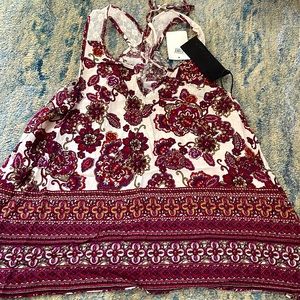 Chloe K NWT women’s small top in a ivory & mauve floral in rayon cotton,…